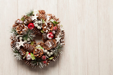 Delicate Christmas wreath of pine cones