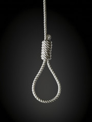 loop of white rope on a black background