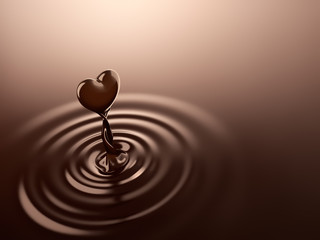 Heart shape chocolate rising from chocolate ripples