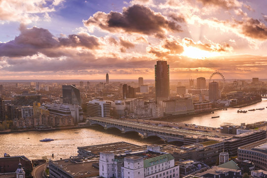 Panoramic skyline view of south and west London at sunset with river Thames and famous landmarks - London, UK