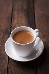 Coffee espresso on a wooden background with copy space