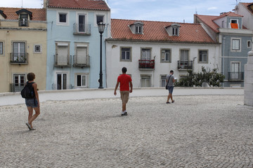 Fototapeta na wymiar three people sightseeing around Lisbon