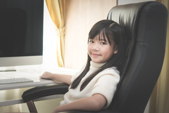 asian girl using computer