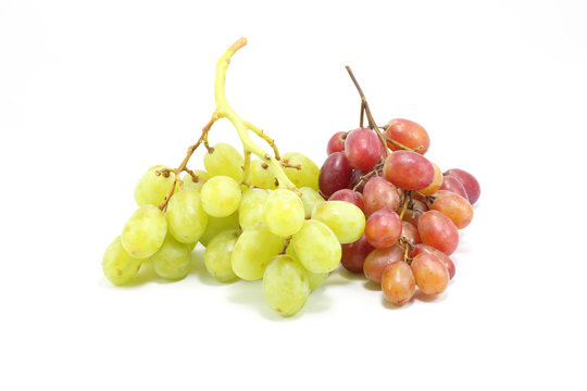 Red and green bunch grapes on white background