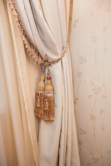 Part of beautifully draped curtain