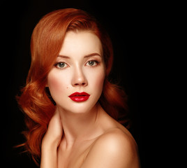 Fototapeta premium Beautiful young woman with red hair.