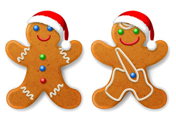 A set of Christmas gingerbread man in a Santa hat, decorated with icing, isolated on white