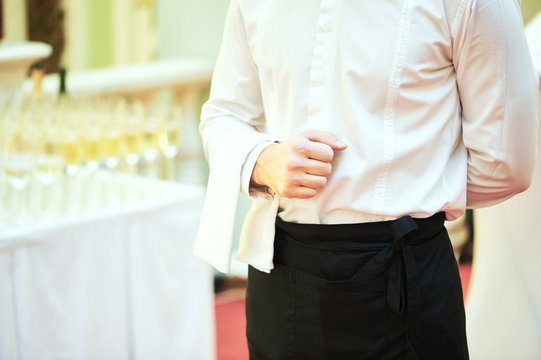 Waiter ready to service at party