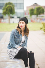 Fototapeta premium Young handsome caucasian blonde straight hair woman sitting on a