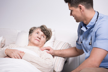 Fototapeta premium Elderly woman with health afflictions
