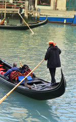 Gondolier on Grand Canal in Venice