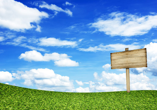 Wood Planks Floor And Wood Sign On Blue Sky