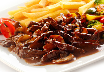 Close up of sliced meat ragout of veal in gravy