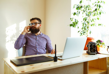 Beard man working from home - modern business concept