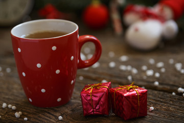 Tea cup with christmas decoration on wooden table