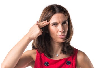 Fototapeta premium Woman making suicide gesture