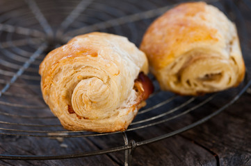 Pastry rolls with bacon and cheese