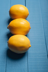 Lemons on blue boards