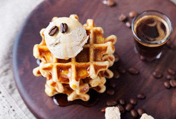 Fresh whole wheat waffles, ice cream, maple syrup