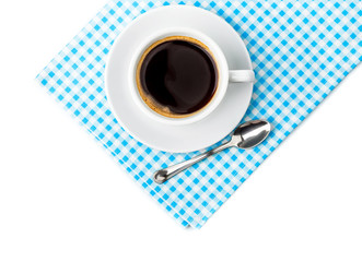 White coffee cup with saucer and spoon tableware on blue