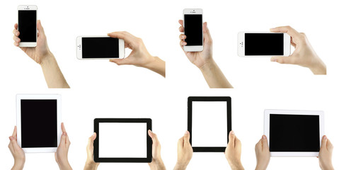 Obraz na płótnie Canvas Hands holding smart phones and tablet-pc, isolated on white