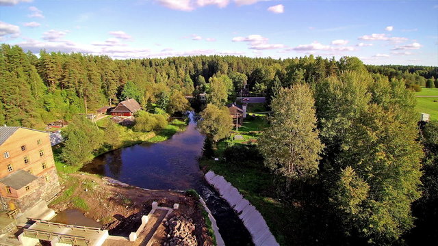 The beautiful Kiidjarve in Estonia. Seen is the green forest with the watermill in the middle of the green forest