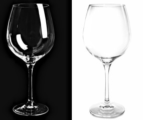 Two empty wine glasses, isolated on black and white backgrounds