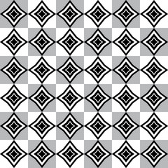 Geometric pattern with grey white and black rhomboid shapes