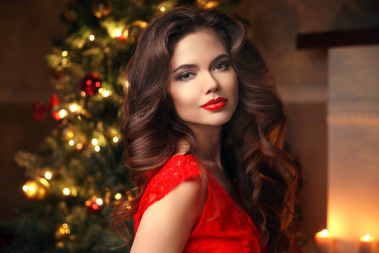 Christmas Santa. Beautiful Smiling Woman Model. Makeup. Healthy