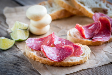 Ciabatta sandwiches with fuet and mini cheese