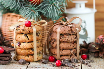 Chocolate cookies and biscuits with cranberries. Christmas gifts