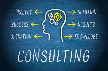 Consulting Business Concept with head and text on blue background