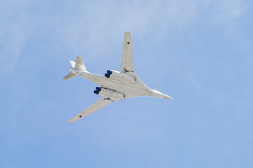 Tupolev Tu-160M (Blackjack) supersonic, variable-sweep wing heavy strategic bomber flies on blue sky background