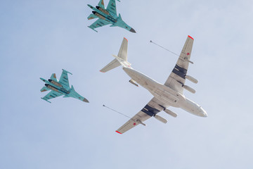 Ilyushin Il-78 (Midas) four-engined aerial refueling tanker demonstrates refueling of 2 Sukhoi...