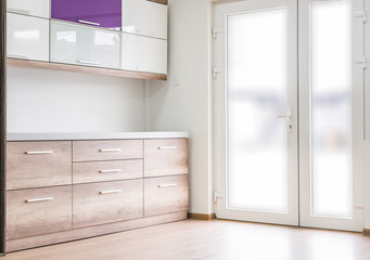 Kitchen cabinets in furniture showroom interior