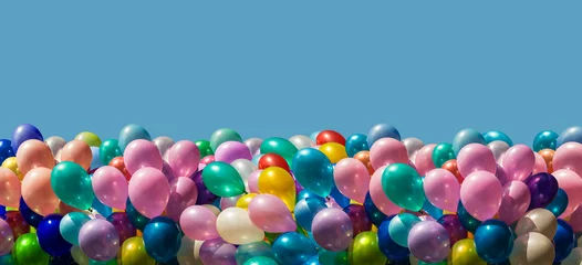Deurstickers Multi-colored balloons isolated on blue © misu