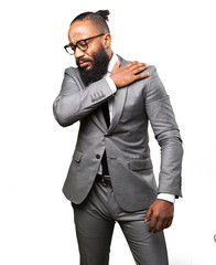 Fototapeta premium business black man suffering shoulders ache