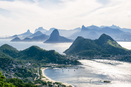 City skyline scenic overlook of Rio de Janeiro, Brazil with Niteroi, Guanabara Bay, and Sugarloaf Mountain