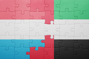 puzzle with the national flag of united arab emirates and luxembourg