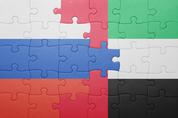 puzzle with the national flag of united arab emirates and russia