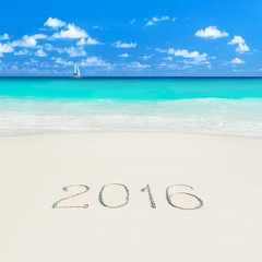 Fototapeta na wymiar Yacht at tropical sandy beach. Season 2016 vacation and travel c