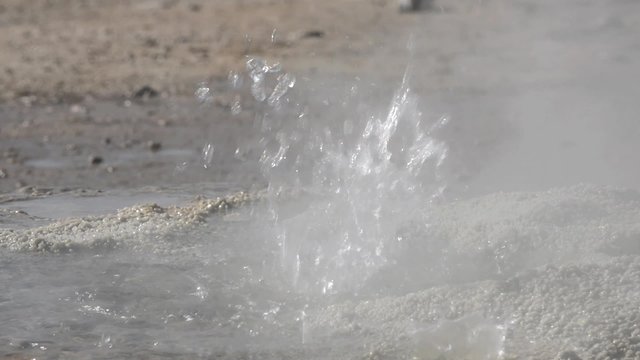 Bubbling geyser at the El Tatio Geyser valley in San Pedro de Atacama, Chile. El Tatio geysers located at 4320 meters above sea level are one of the major tourist attraction in Chile.