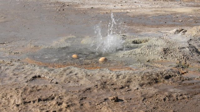 Two eggs boiling in geothermal waters of the El Tatio geyser in San Pedro de Atacama, Chile. 