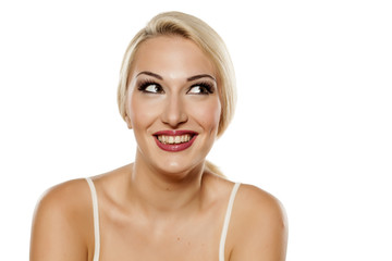 portrait of smiling attractive blonde with makeup