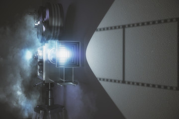 Fototapeta premium Old style movie camera with grey wall