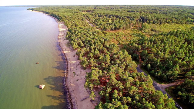 The top view of the one of the largest lake in Estonia. The Kuremaa lake with lots of tree on the forest surronding the lake