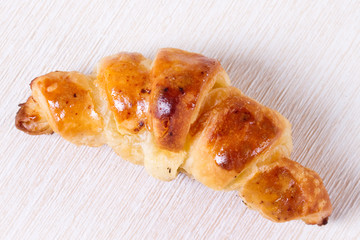 Croissant on a white surface