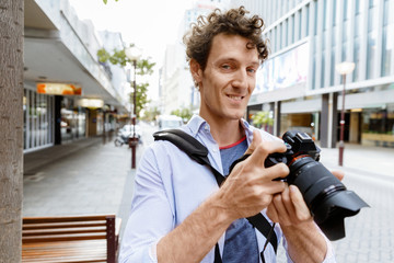 Male photographer taking picture