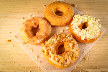 Donuts on wooden background