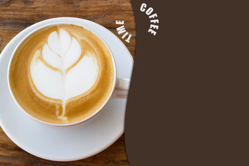 Close up cup of Coffee, latte on the wooden table